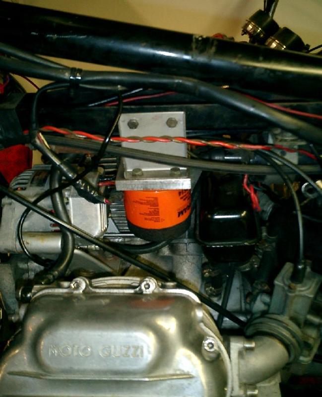 filter from left side showing line to head and support bracket